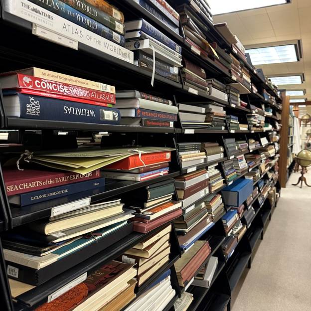 Printed atlas books from different time periods